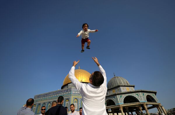 أجواء الاحتفال بعيد الأضحى في ساحة مسجد الأقصى، القدس، فلسطين 20 يوليو 2021 - سبوتنيك عربي