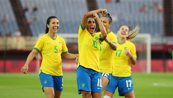 أولمبياد طوكيو 2020 - كرة القدم - سيدات - المجموعة السادسة - الصين - البرازيل - ملعب مياجي ، مياجي ، اليابان - 21 يوليو 2021. البرازيلية مارتا تحتفل بتسجيل هدفها الثالث. - سبوتنيك عربي