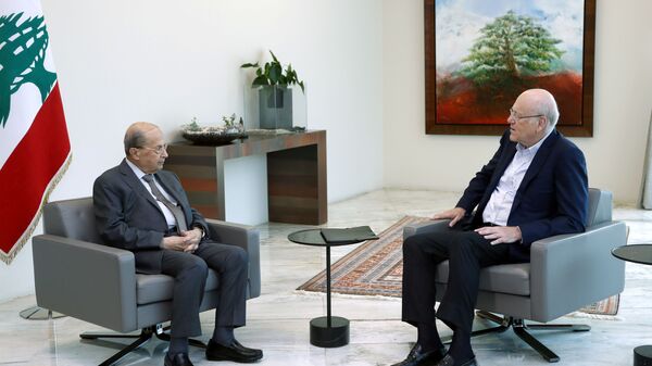 رئيس الحكومة اللبناني المكلف نجيب ميقاتي، والرئيس اللبناني ميشال عون، لبنان، 26 يوليو 2021 - سبوتنيك عربي