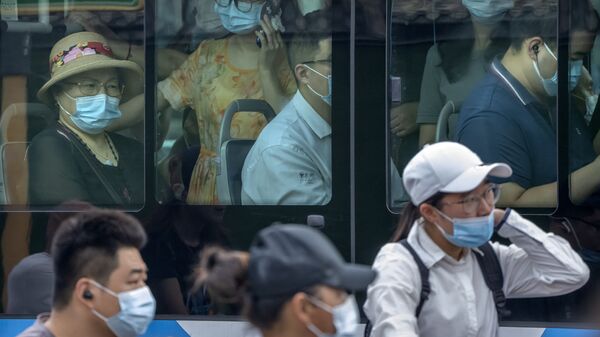 ظهور حالات الإصابة بـ كوفيد-19 في الصين، وفرض ارتداء الكمامات واختبارات كورونا على المواطنين من جديد، 5 أغسطس 2021 - سبوتنيك عربي