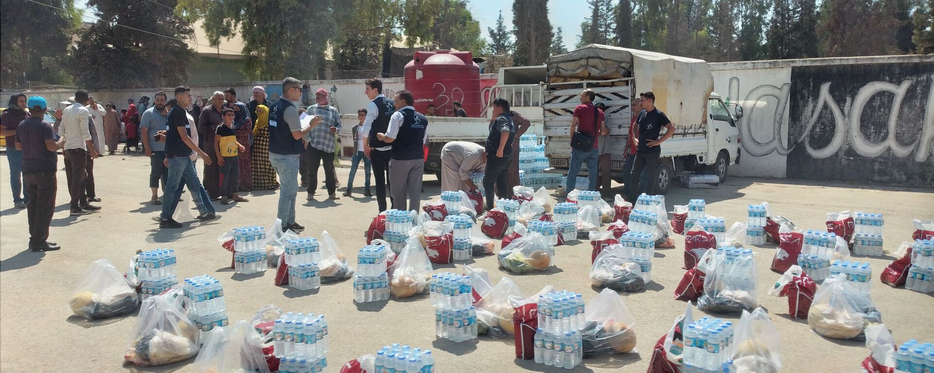 مساعدات إغاثية عاجلة في الحسكة، سوريا 31 أغسطس 2021 - سبوتنيك عربي, 1920, 13.06.2022