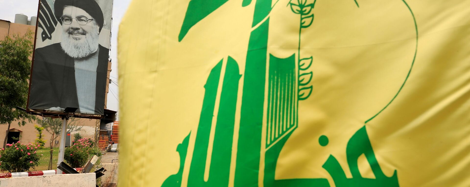 لافتة للأمين العام لـ حزب الله، حسن نصرالله، لبنان 7 يلويو 2020 - سبوتنيك عربي, 1920, 16.02.2022
