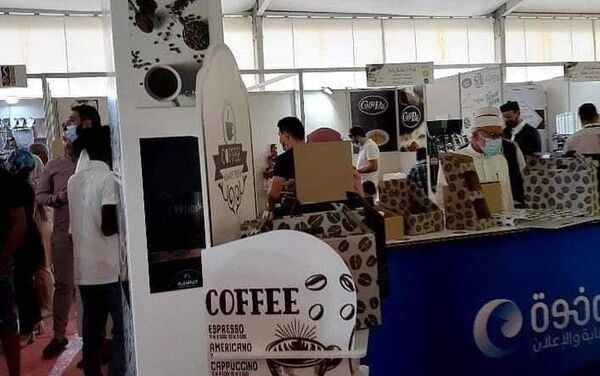 أحد أجنحة معرض ليبيا الأول للقهوة - سبوتنيك عربي