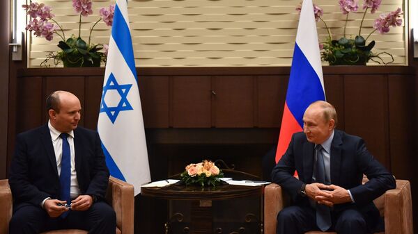الرئيس الروسي فلاديمير بوتين خلال لقائه مع رئيس الوزراء الإسرائيلي نفتالي بينيت في سوتشي، روسيا 22 أكتوبر 2021 - سبوتنيك عربي