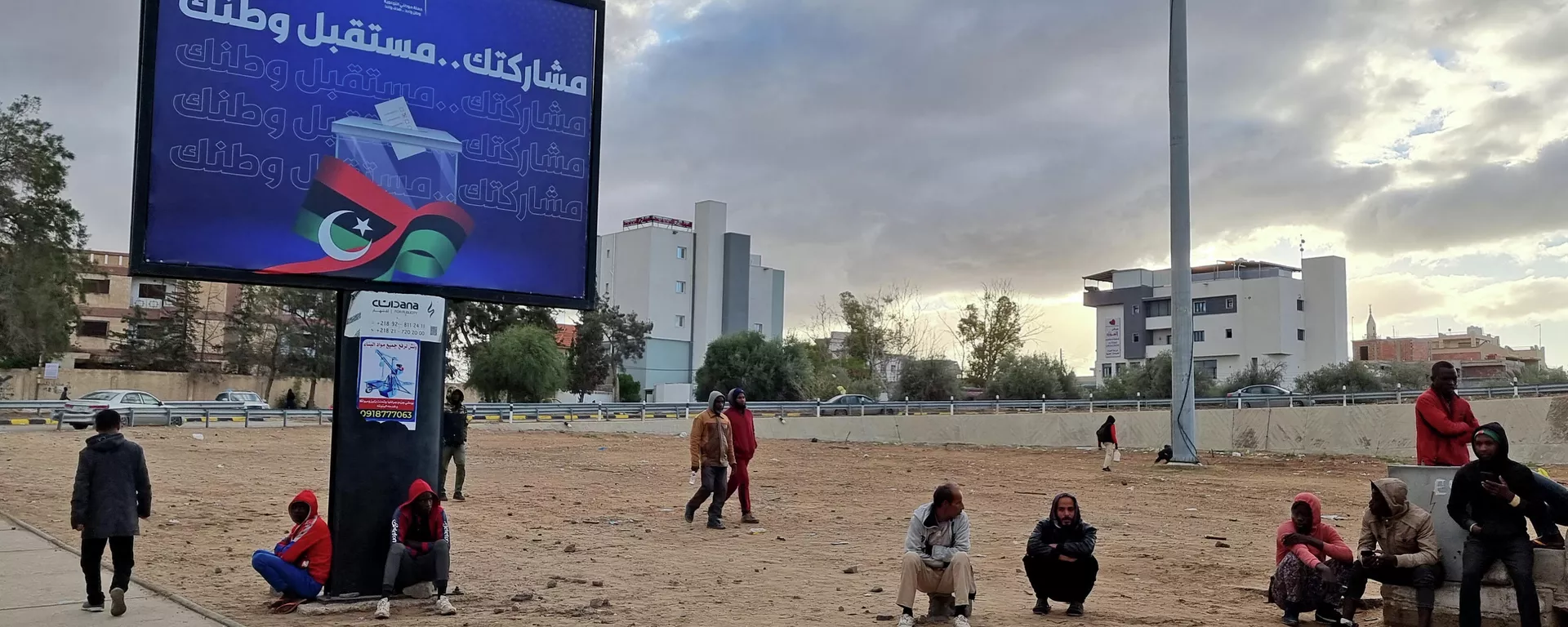 لافتة المشاركة في الانتخابات الرئاسية الليبية في طرابلس، ليبيا، 14 ديسمبر 2021 - سبوتنيك عربي, 1920, 09.04.2023