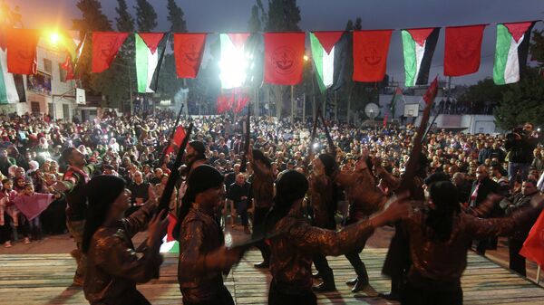 أنصار الجبهة الشعبية لتحرير فلسطين يحتفلون بذكرى تأسيسها - سبوتنيك عربي
