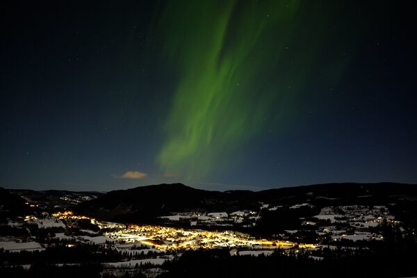 الشفق القطبي، والمعروف أيضا باسم أضواء الشمال، في النرويج، 17 يناير 2022. - سبوتنيك عربي