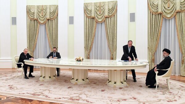 لقاء الرئيس الروسي فلاديمير بوتين والرئيس الإيراني إبراهيم رئيسي في موسكو، روسيا 19 يناير 2022 - سبوتنيك عربي