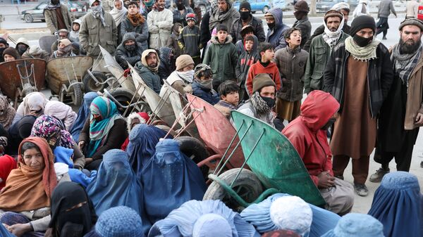 توزيع الخبز على المواطنين في كابول، أفغانستان، 31 يناير 2022. - سبوتنيك عربي