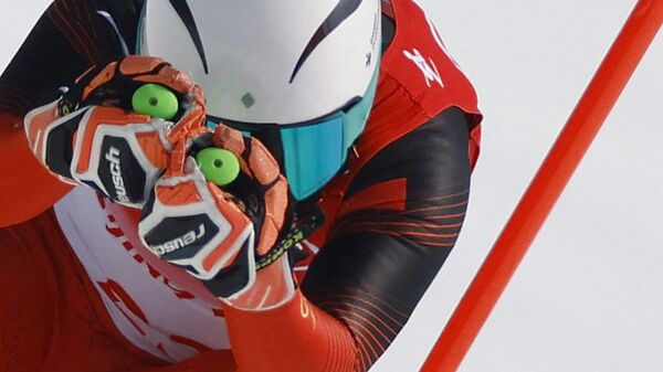 Китайский горнолыжник Янмин Чжан на XXIV зимних Олимпийских играх в Пекине - سبوتنيك عربي