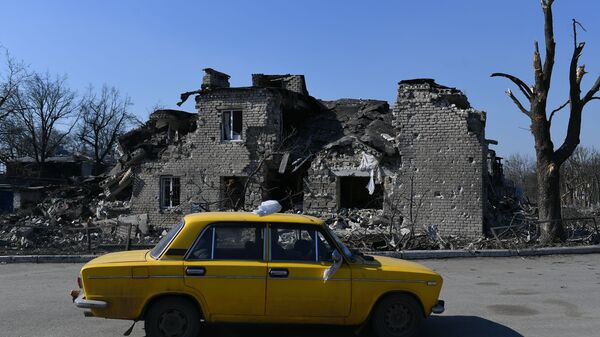 مدينة فولنوفاخا بعد قصف القوات المسلحة الأوكرانية، إقليم دونباس 21 مارس 2022 - سبوتنيك عربي