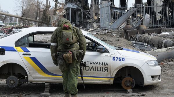 قوات دونيتسك الشعبية تنتشر في شوارع مدينة ماريوبول، أوكرانيا 31 مارس 2022 - سبوتنيك عربي