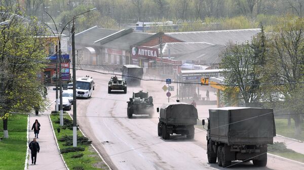 قوات جمهورية لوغانسك الشعبية على الحدود بين لوغانسك ومنطقة خاركوف، أوكرانيا 20 أبريل 2022 - سبوتنيك عربي