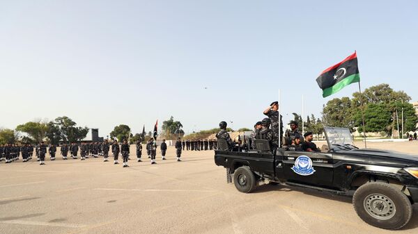 الشرطة في ليبيا أثناء عرض عسكري - سبوتنيك عربي