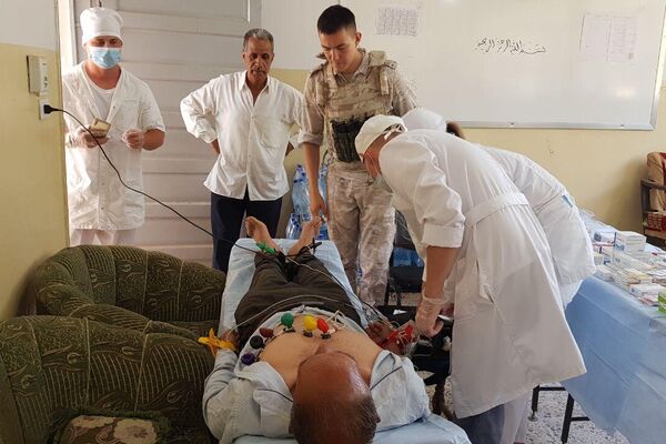 الجيش الروسي يقدم خدمات طبية ومساعدات غذائية لقرية سورية - سبوتنيك عربي