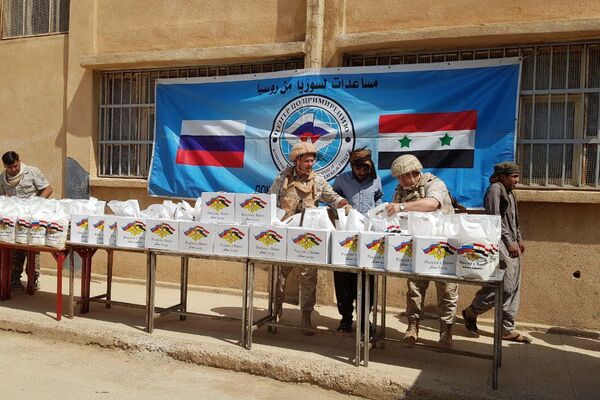 الجيش الروسي يقدم خدمات طبية ومساعدات غذائية لقرية سورية - سبوتنيك عربي