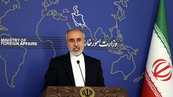 المتحدث باسم وزارة الخارجية الإيرانية، ناصر كنعاني، في مؤتمر صحفى بمقر الخارجية الإيرانية في طهران، اليوم الأربعاء، 13 يوليو/تموز 2022 - سبوتنيك عربي