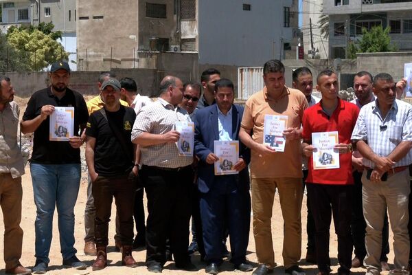 وقفة احتجاجية في غزة على زيارة بايدن إلى فلسطين - سبوتنيك عربي