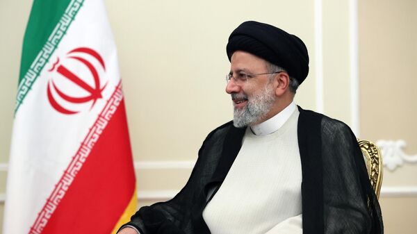 الرئيس الإيراني إبراهيم رئيسي خلال لقاء مع الرئيس الروسي فلاديمير بوتين في طهران - سبوتنيك عربي