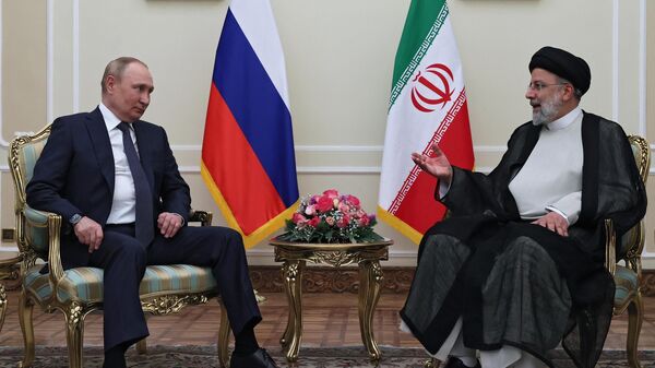 الرئيس الروسي فلاديمير بوتين والرئيس الإيراني إبراهيم رئيسي في طهران - سبوتنيك عربي