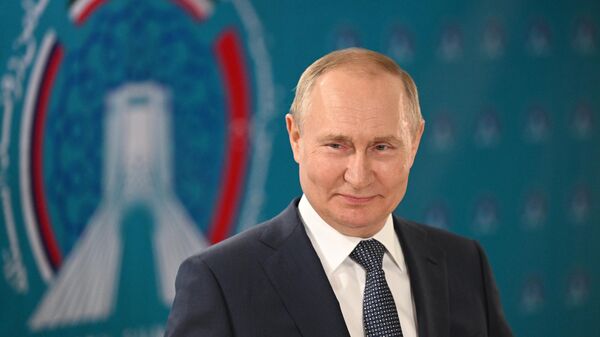 الرئيس الروسي فلاديمير بوتين خلال مؤتمر صحفي في ختام القمة الثلاثية المنعقدة في طهران الثلاثاء 19 يوليو 2022 - سبوتنيك عربي