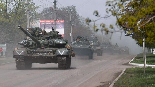 قوات روسية في مدينة كوبيانسك بمقاطعة خاركوف (أوكرانيا). - سبوتنيك عربي