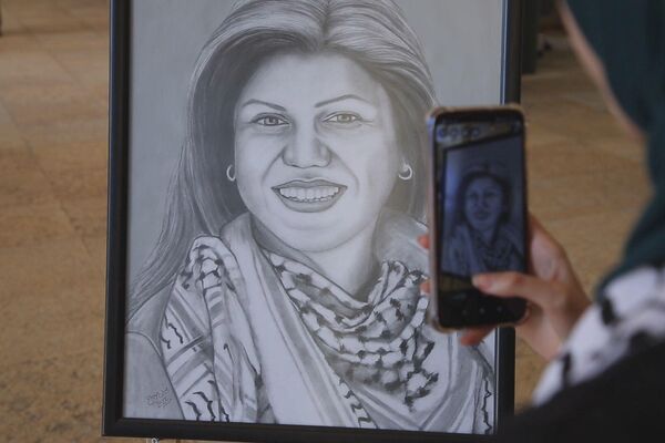 معرض على مسافة قريبة لتخليد ذكرى الصحفية شيرين أبو عاقلة - سبوتنيك عربي