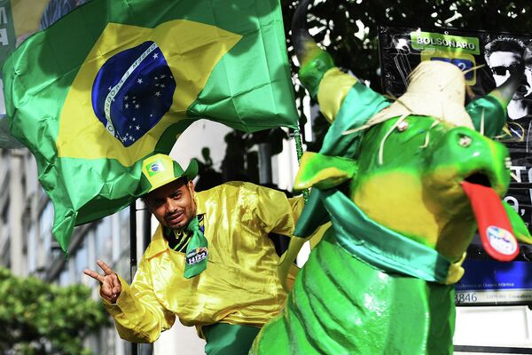أنصار الرئيس البرازيلي جايير بولسونارو يشارك في الاحتفالات بمناسبة الذكرى المئوية الثانية لاستقلال البرازيل، في شارع باوليستا ، في ساو باولو، البرازيل، في 7 سبتمبر 2022. - سبوتنيك عربي