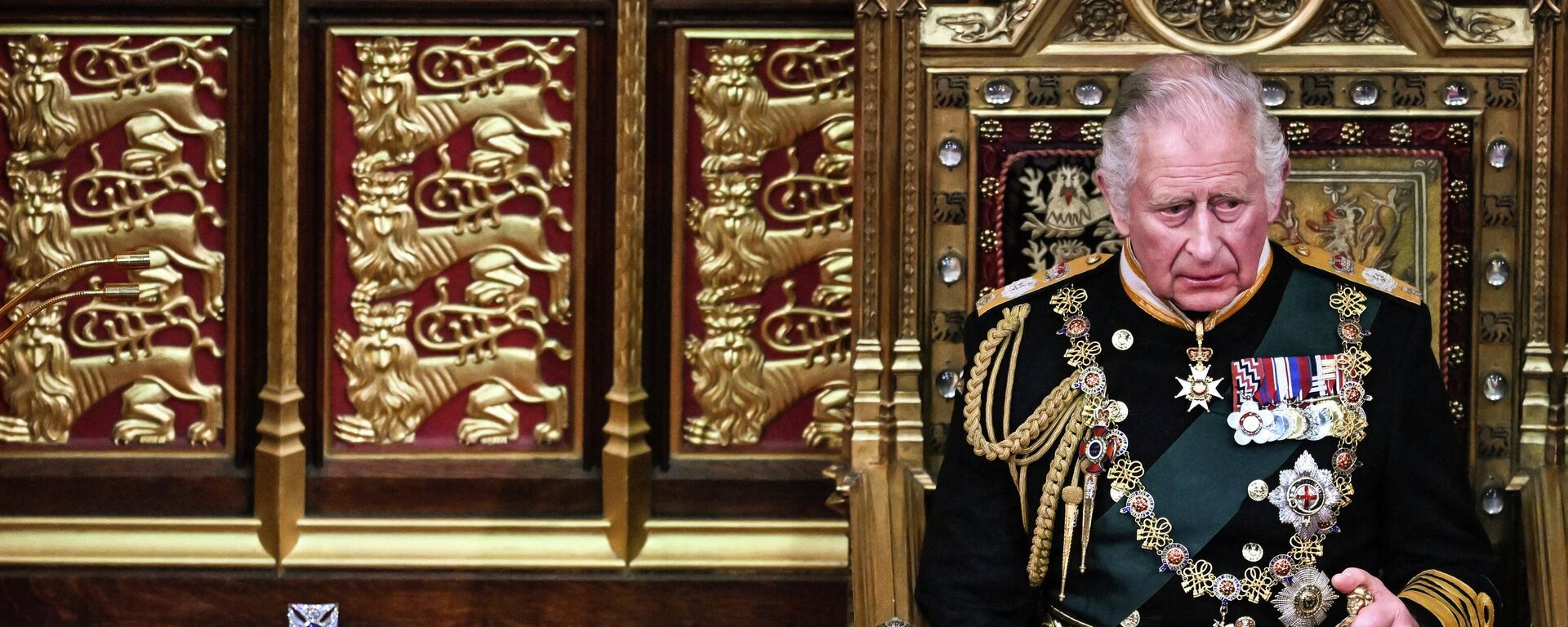 الأمير تشارلز يجلس أمام تاج الدولة الإمبراطوري في غرفة مجلس اللوردات، خلال الافتتاح الرسمي للبرلمان، في مجلسي البرلمان، في لند ، إنجلترا 10 مايو 2022. - سبوتنيك عربي, 1920, 19.01.2023