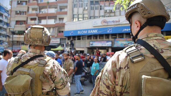 المودعون اللبنانيون اعلنوا الحرب على المصارف والإقتحامات بالجملة - سبوتنيك عربي