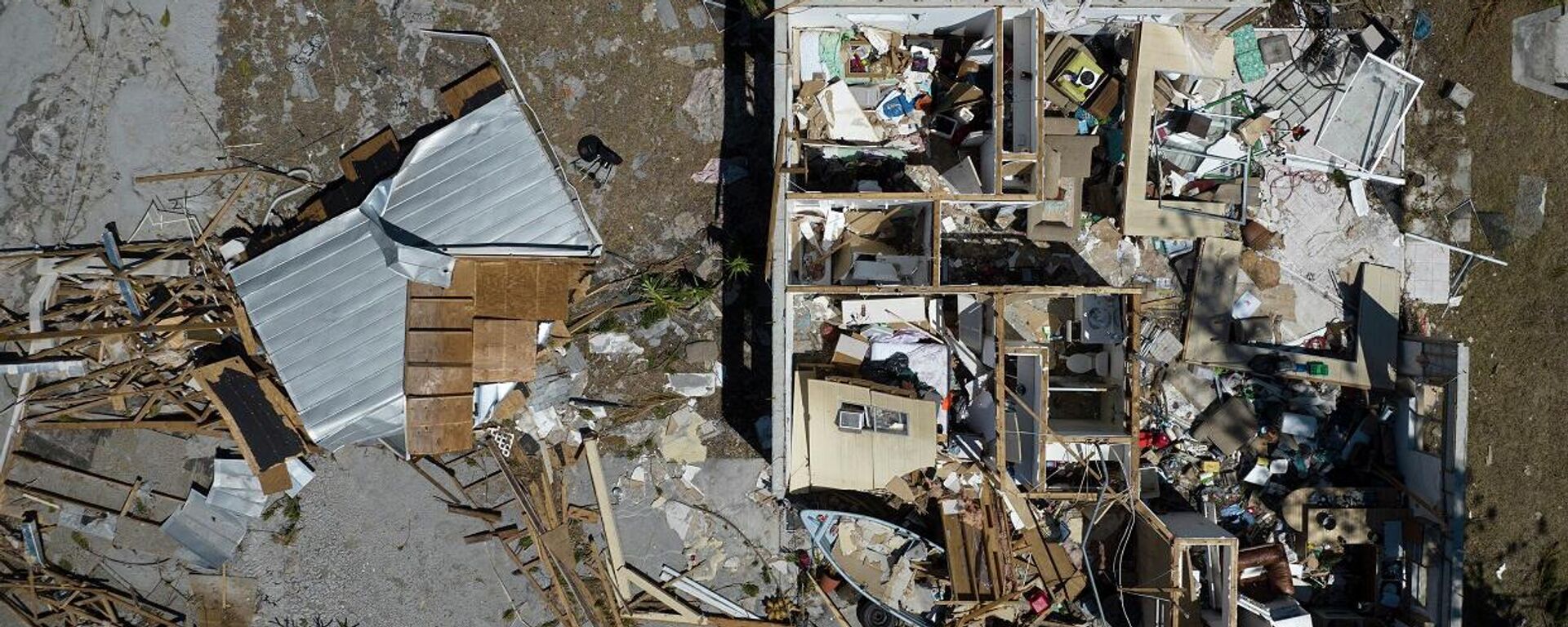 صورة التقطت من الجو تظهر منزلا مدمرا في أعقاب إعصار إيان في ويست إنلاند، ماتلاتشا، فلوريدا، أمريكا، 3 أكتوبر/ تشرين الأول 2022  - سبوتنيك عربي, 1920, 04.10.2022