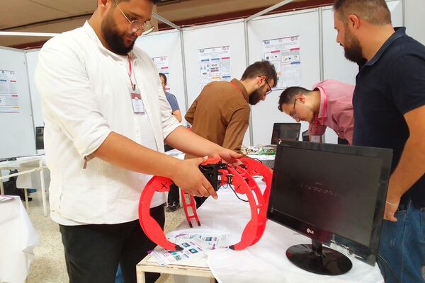 معرض الطلاب المتميزين الذي تقيمه كلية الهندسة الميكانيكية والكهربائية بجامعة دمشق تحت شعار: معاً للبناء والابتكار في موسمه الخامس للعام 2022. - سبوتنيك عربي