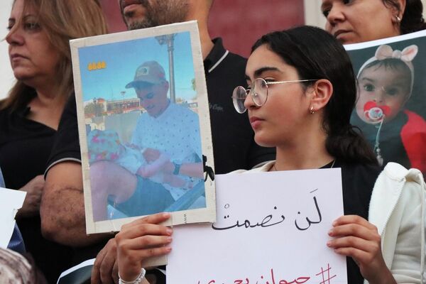 أسر وعائلات المهادرين التونسيين تطالب بحقوقهم - سبوتنيك عربي