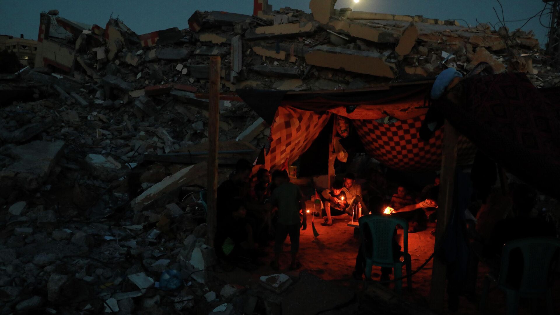 آثار قصف سلاح الجو الإسرائيلي على قطاع غزة، فلسطين، مايو 2021 - سبوتنيك عربي, 1920, 02.02.2023