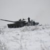 Танк Т-72 и мобилизованные военнослужащие во время подготовки на Чебаркульском полигоне в Челябинской области - سبوتنيك عربي