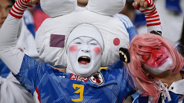 Болельщики сборной Японии перед началом матча группового этапа чемпионата мира по футболу между сборными Японии и Испании - سبوتنيك عربي