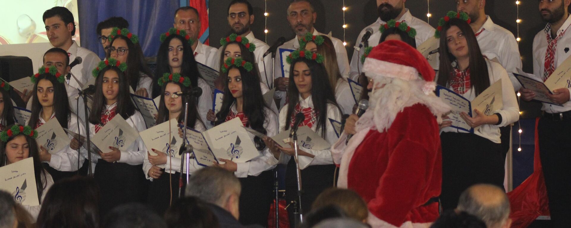 مسيحيو شرق سوريا ينشدون تراتيل الميلاد والأرض والوطن - سبوتنيك عربي, 1920, 23.12.2022