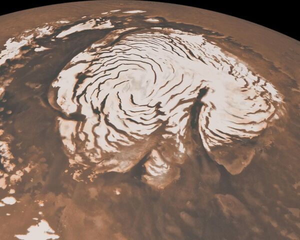 منظر للسطح المغطى بالجليد للقطب الشمالي لكوكب المريخ - سبوتنيك عربي
