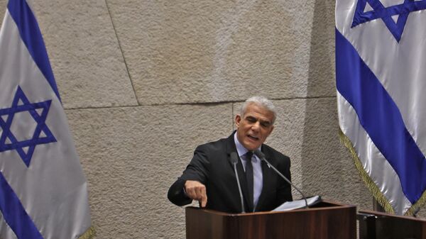 رئيس الحكومة الإسرائيلية المنتهية ولايته يائير لابيد - سبوتنيك عربي