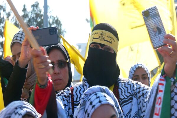 إحياء الذكرى 58 لانطلاقة حركة التحرير الوطني الفلسطيني فتح في غزة 31 ديسمبر 2022 - سبوتنيك عربي