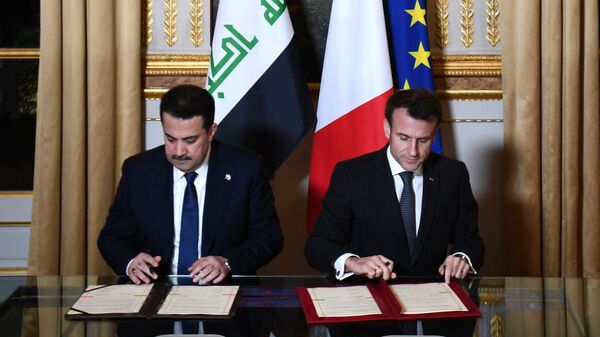 الرئيس الفرنسي إيمانويل ماكرون ورئيس الوزراء العراقي محمد شياع السوداني - سبوتنيك عربي