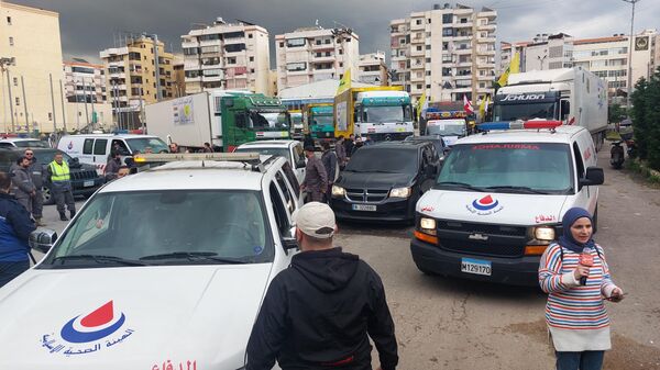 حزب الله يطلق قافلة مساعدات ضخمة نحو سوريا - سبوتنيك عربي
