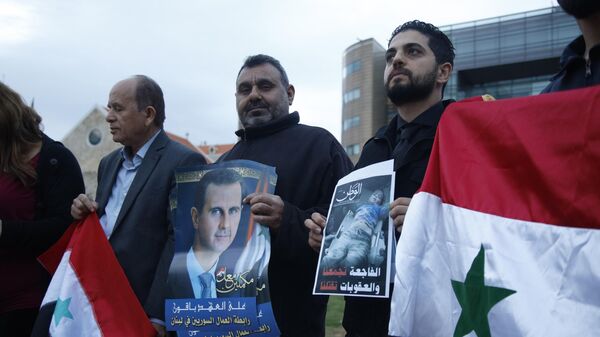 وقفة أمام مقر الأمم المتحدة في بيروت للمطالبة برفع الحصار عن سوريا - سبوتنيك عربي
