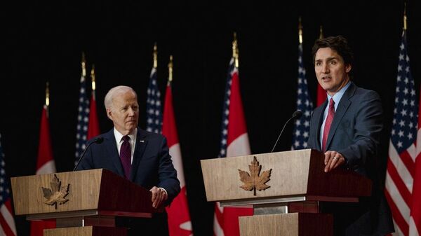 رئيس الوزراء الكندي، جاستن ترودو، والرئيس الأمريكي، جو بايدن، في مؤتمر صحفي بكندا، 24 مارس/ آذار 2023 - سبوتنيك عربي