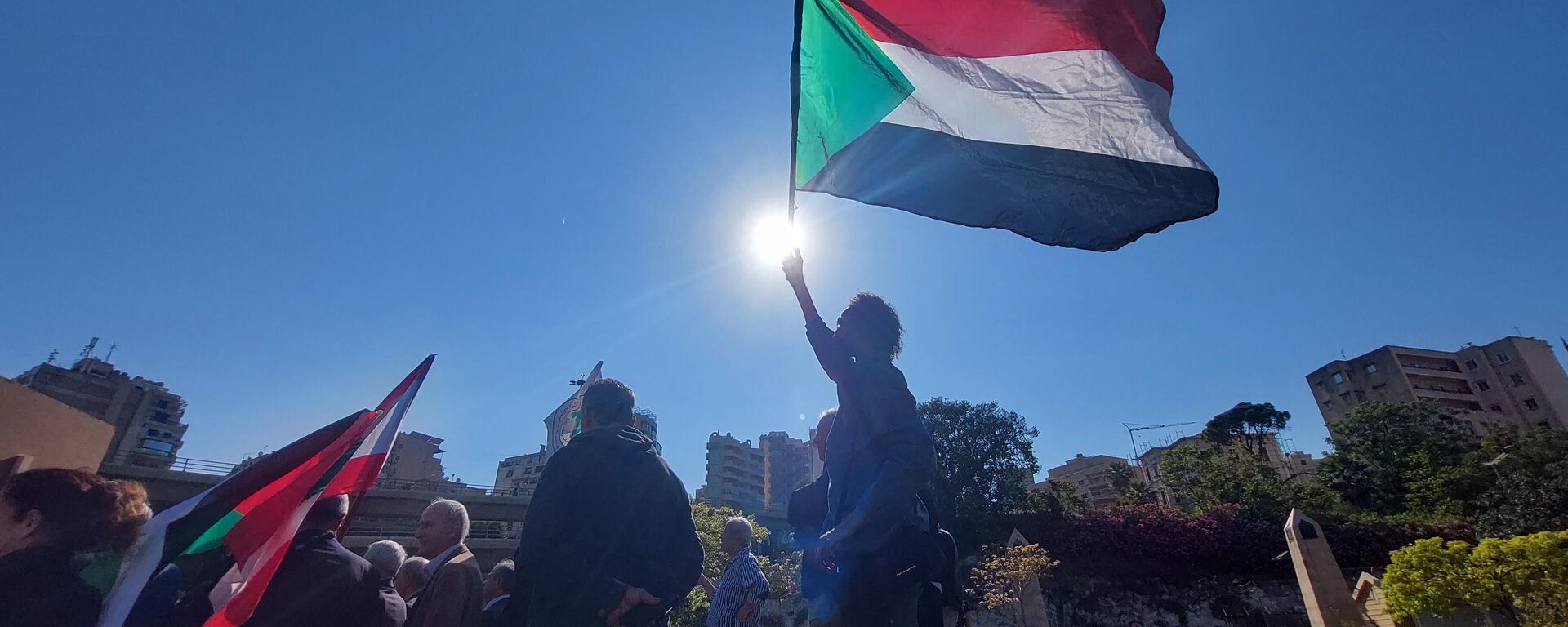 وقفة احتجاجية أمام مبنى الأمم المتحدة في بيروت لوقف الإقتتال في السودان - سبوتنيك عربي, 1920, 21.05.2023