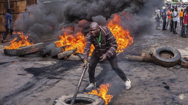 احتجاجات ضد تكاليف المعيشة وإصلاحات اللجنة الانتخابية، اشتباكات مع قوات الشرطة في نيروبي، كينيا - سبوتنيك عربي