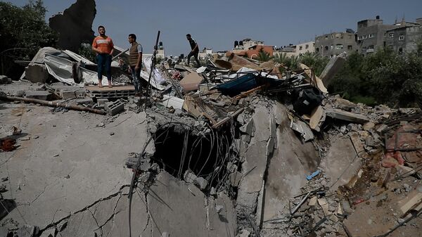 الجيش الإسرائيلي يدمر 20 منزلا في قطاع غزة، 13 مايو/ أيار 2023 - سبوتنيك عربي