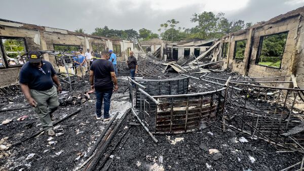 حريق متعمد بمدرسة داخلية يودي بحياة 20 طفلا في غيانا، 22 مايو 2023 - سبوتنيك عربي