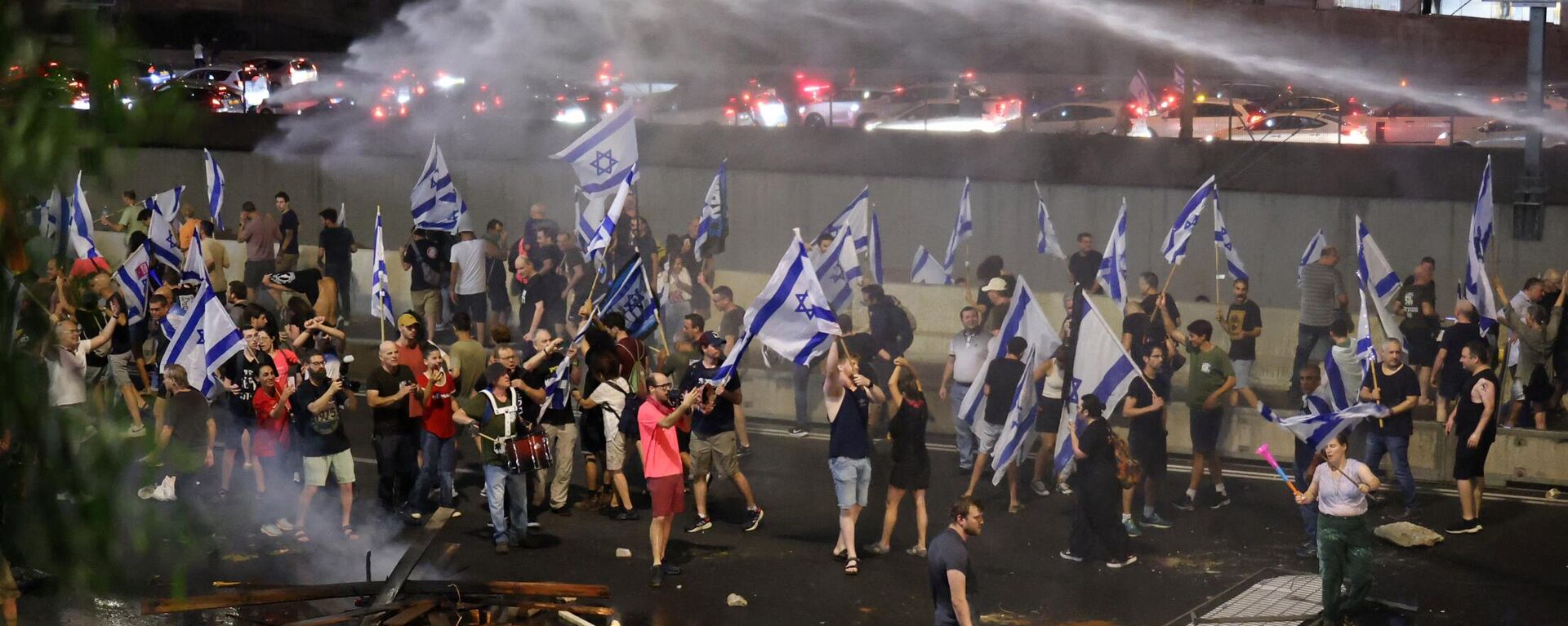 احتجاجت الإسرائيليين ضد خطط حكومة رئيس الوزراء بنيامين نتنياهو لإصلاح النظام القضائي في تل أبيب، إسرائيل، 5 يوليو 2023 - سبوتنيك عربي, 1920, 15.07.2023