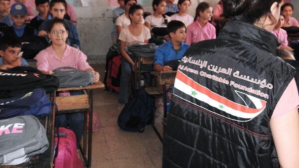 مؤسسة إنسانية توزع آلاف الحقائب وأدوات القرطاسية على طلاب المدارس السورية - سبوتنيك عربي